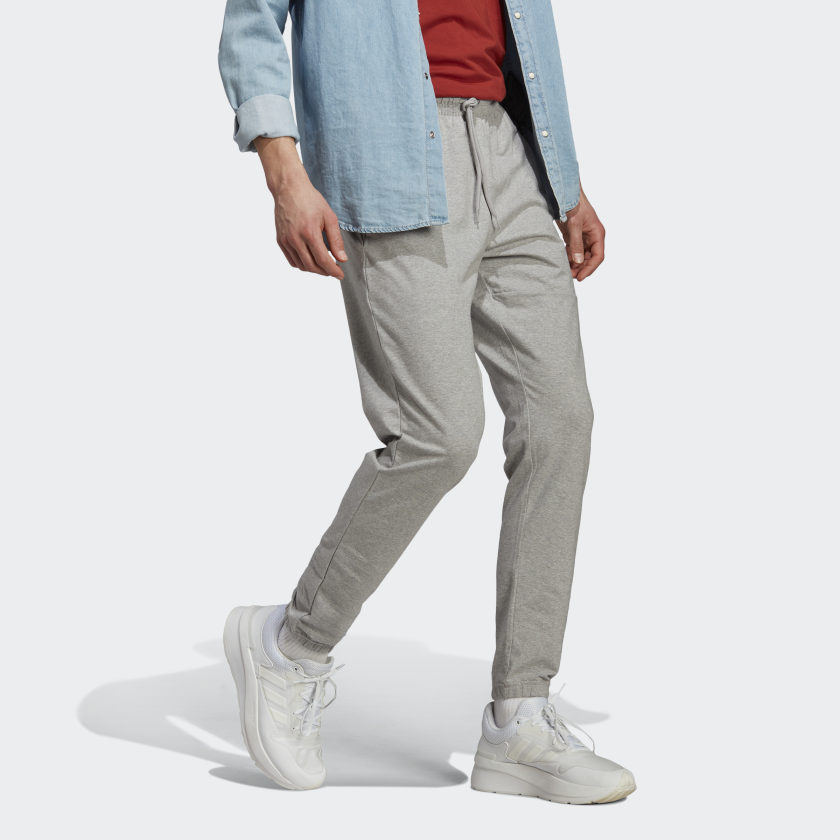 Men's adidas Essentials Single Jersey Tapered Badge of Sport Pants