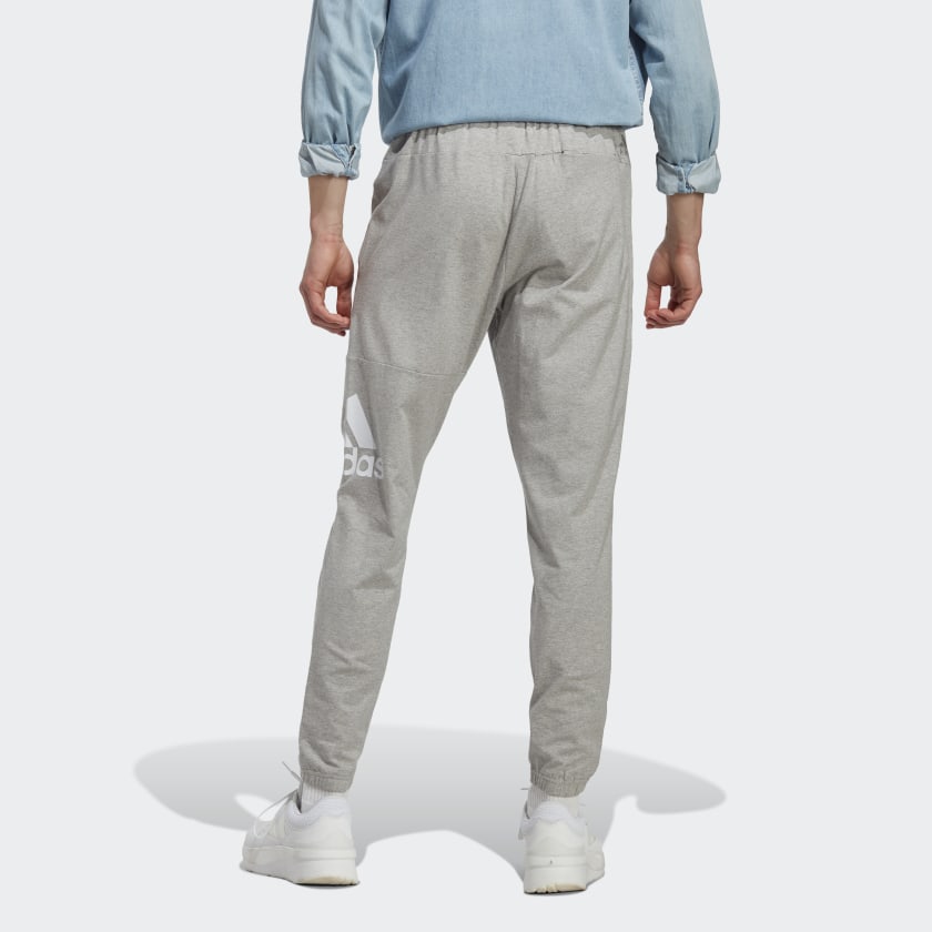 Men's adidas Essentials Single Jersey Tapered Badge of Sport Pants