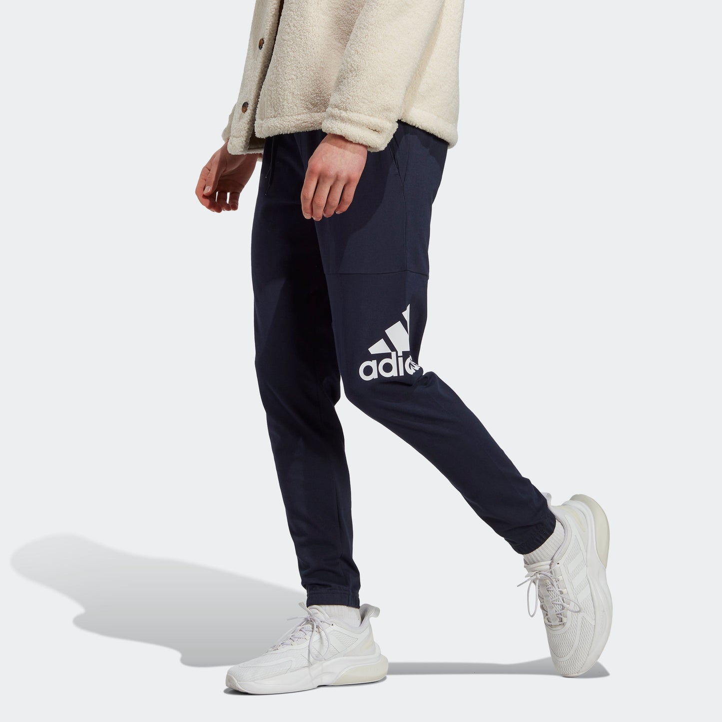 Men's adidas Essentials Single Jersey Tapered Badge of Sport Pants