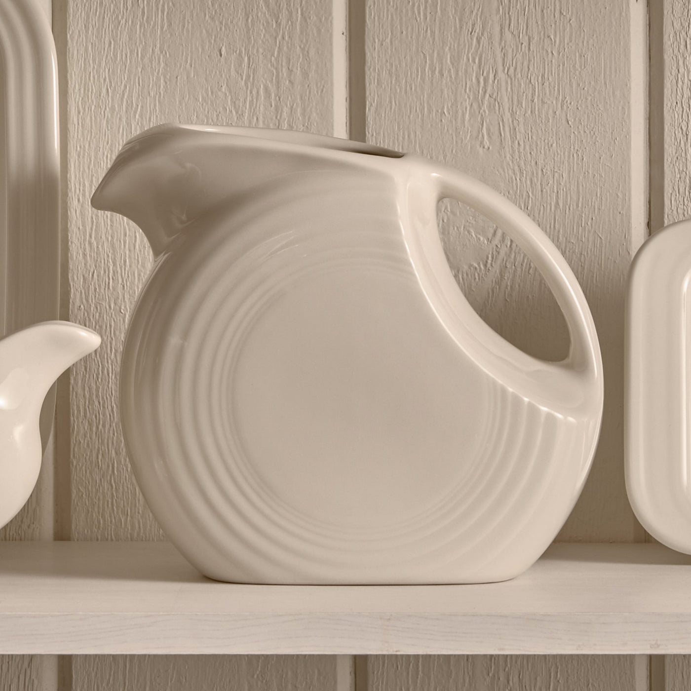 67 OZ Large Disk Pitcher